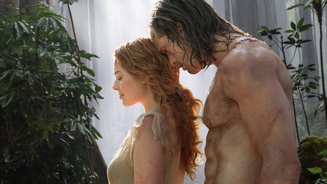 Tarzan (Alexander Skargasd) and his wife, Jane (Margot Robbie).