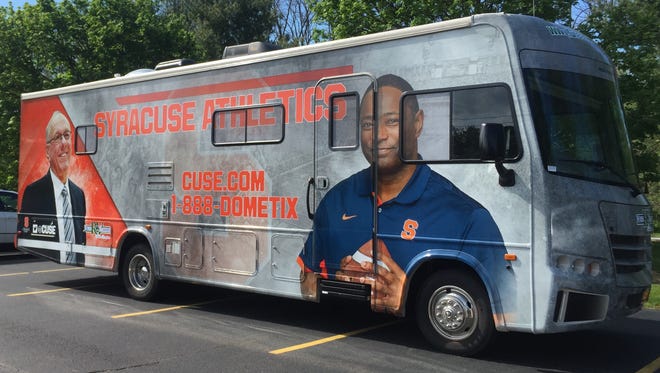 Syracuse University's "No Huddle Tour'' rolled into Monroe Golf Club Tuesday. Basketball coach Jim Boeheim and football coach Dino Babers spoke with alumni and fans.