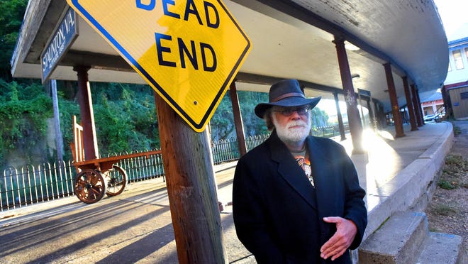 Ghost Hunter Curtis Wimer is photographed at the Staunton train station, a location he has investigated, on Monday, Oct. 12, 2015.