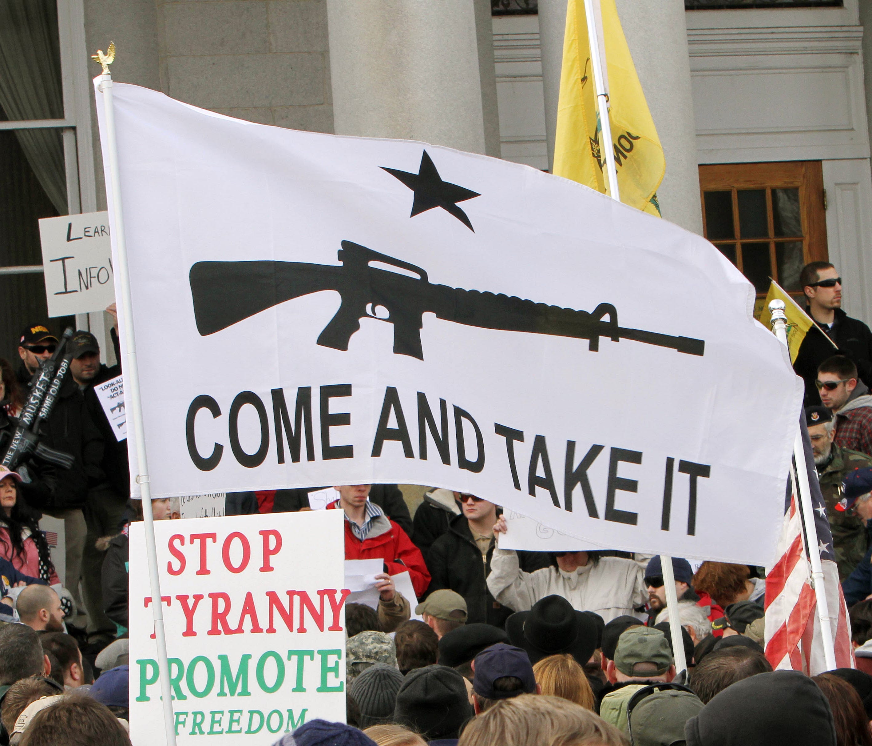 Hundreds of gun supporters rally at the New Hampshire Statehouse in Concord, N.H., Jan. 19, 2013.