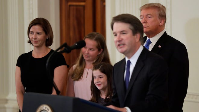 Judge Brett Kavanaugh and his family at the White House with President Donald Trump on July 9, 2018.