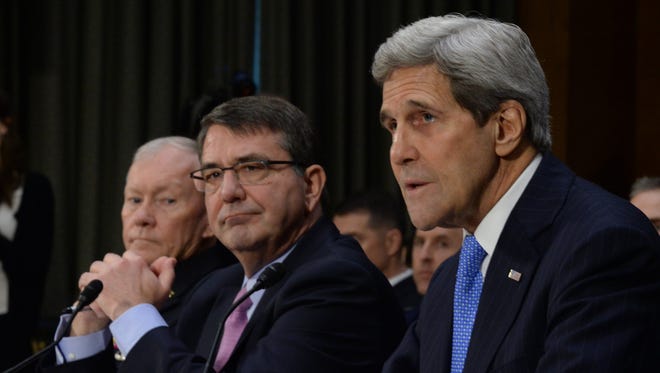 Joint Chiefs Chairman Gen. Martin Dempsey, Secretary of Defense Ashton Carter and Secretary of State John Kerry testify at a Senate Foreign Relations Committee hearing on March 11, 2015.
