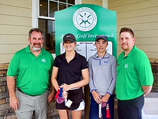 Two young golfers captured a memorial tournament recently