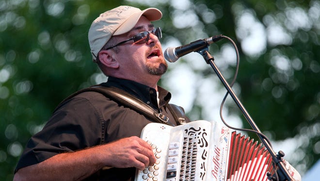 Daily Advertiser
Horace Trahan and the Ossun Express play "Le Grand Hoorah" at Chicot State Park.