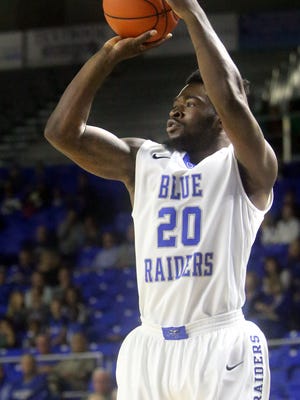 MTSU's Giddy Potts (20) goes up for a 3 point shot agaisnt South Alabama during the MTSU home game, Saturday Dec.. 5, 2015.
