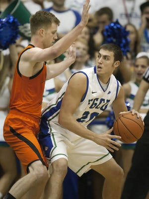 Former foes Chase Fieler, right, of FGCU and Jake Gollon of Mercer will be teammates for Bracket Busters in the $1 million The Basketball Tournament.