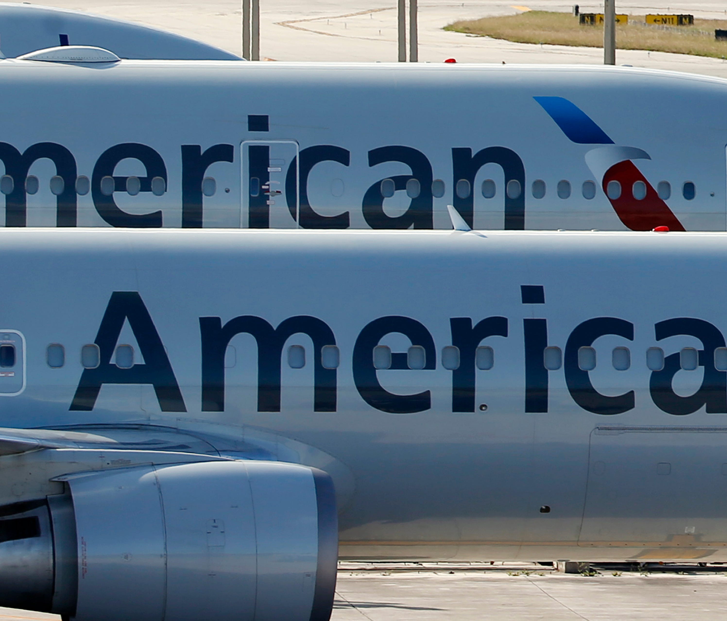 American Airlines jets parked at Miami International Airport on Nov. 6, 2017.