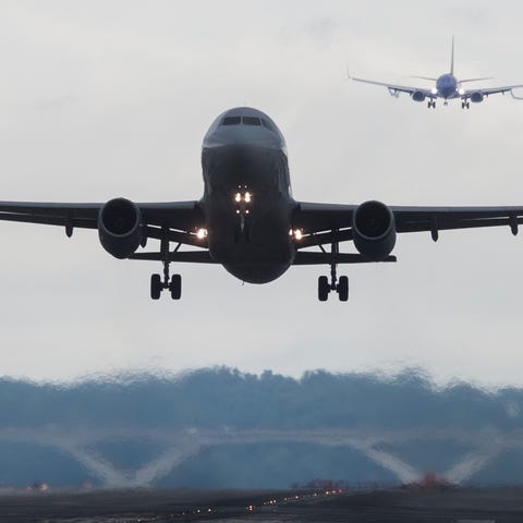 Airplanes take off and land at Ronald Reagan...