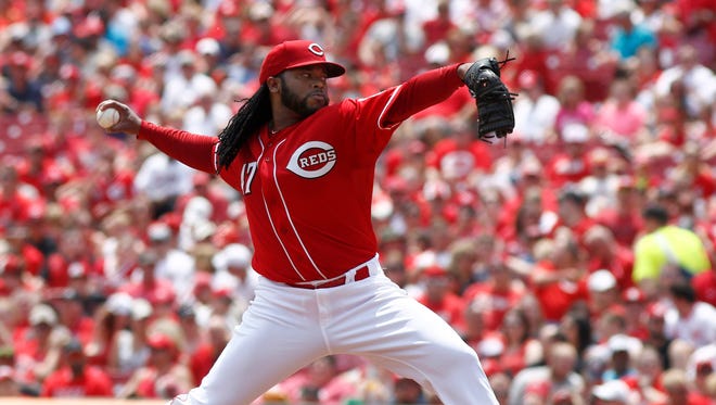 Reds starting pitcher Johnny Cueto throws the ball in the third inning on June 7.