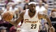 LeBron James of the Cleveland Cavaliers heads up court
