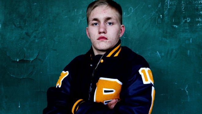 Clay Celli is the 106-pound city wrestling champion. He was adopted from Russia by a local family at a young age.