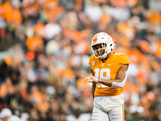 Tennessee defensive back Nigel Warrior (18) walks on