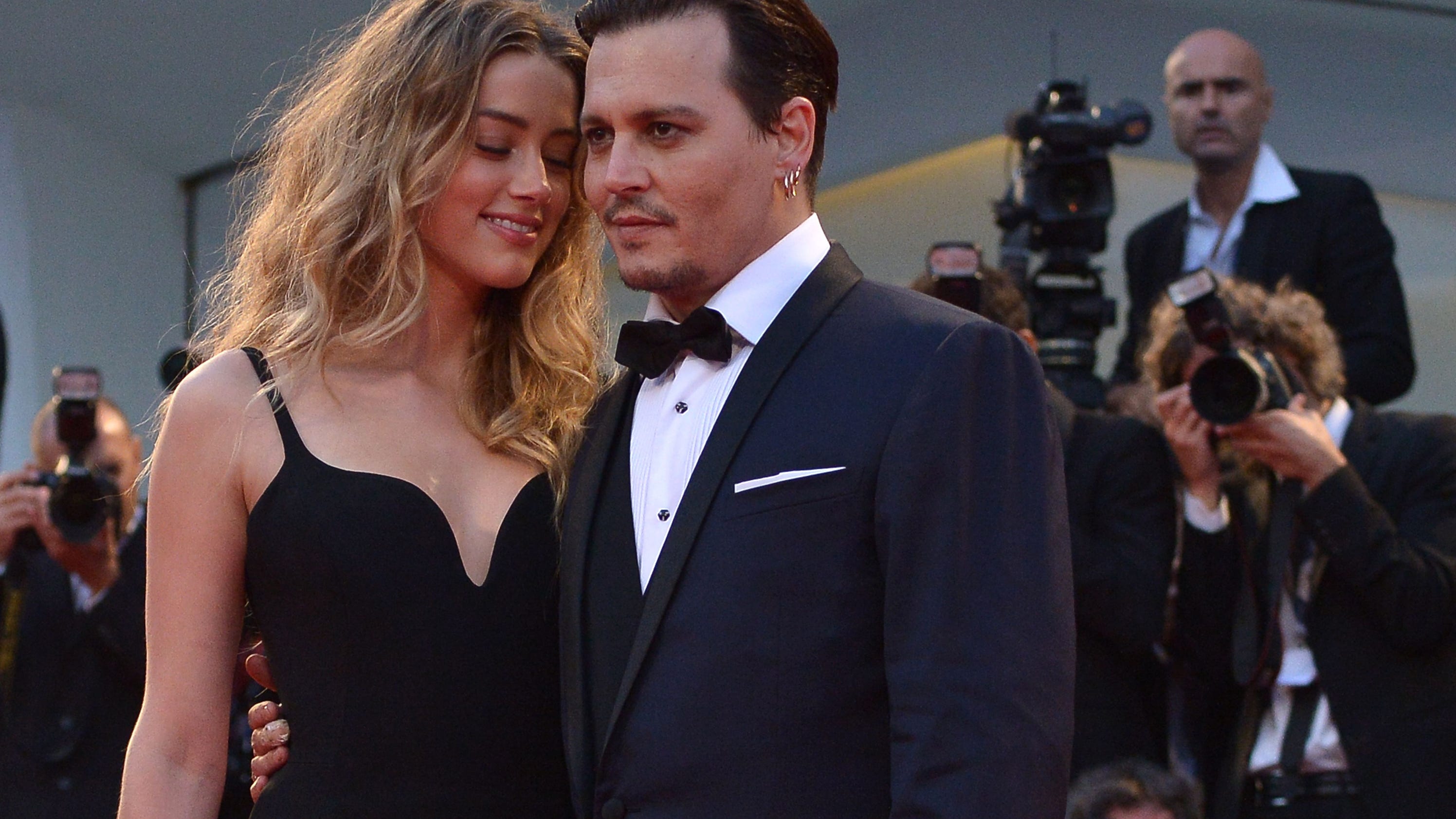 johnny-depp-and-amber-heard-show-off-lots-of-bling-in-rare ...