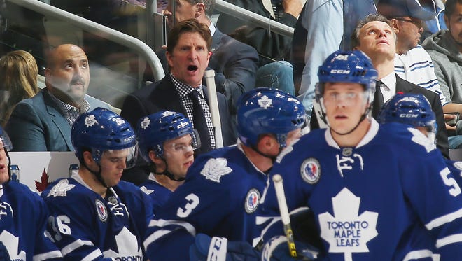 496051844.jpg TORONTO, ON - NOVEMBER 06: Mike Babcock of the Toronto Maple Leafs takes a second period timeout during the game against the Detroit Red Wings at the Air Canada Centre on November 6, 2015 in Toronto, Ontario, Canada.