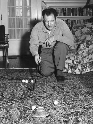 Clarence "Biggie" Munn, above, was Michigan State's