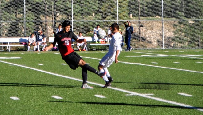 The Ruidoso Warriors boys soccer team took on district rival Portales for a 5-2 loss at home Oct 4.