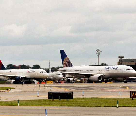 Planes line up for take off at LaGuardia Airport in East Elmhurst, N.Y., on Aug. 8, 2017.