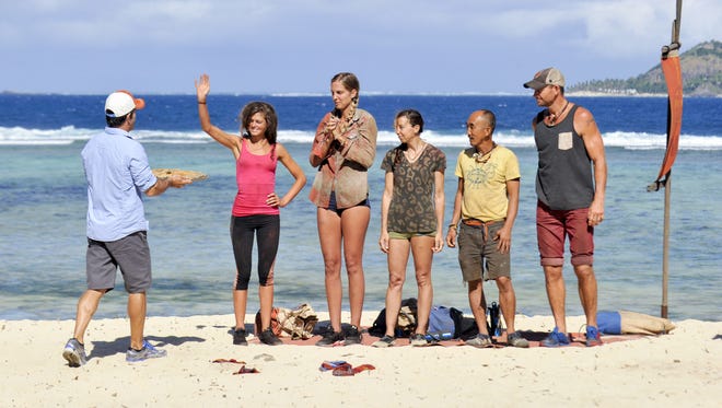 Jeff Probst hands out the new buffs to Hali Ford, Sierra Dawn-Thomas, Debbie Wanner, Tai Trang and Brad Culpepper on the sixth episode of Survivor: Game Changers.