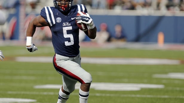Mississippi running back I'Tavius Mathers (5) runs upfield against Alabama during the first half of an NCAA college football game in Oxford, Miss., Saturday, Oct. 4, 2014. No. 11 Mississippi won 23-17. (AP Photo/Rogelio V. Solis)