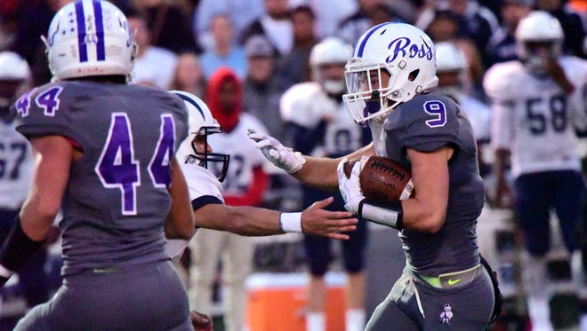 Noah Hotz runs with the football for Fremont Ross on Friday.