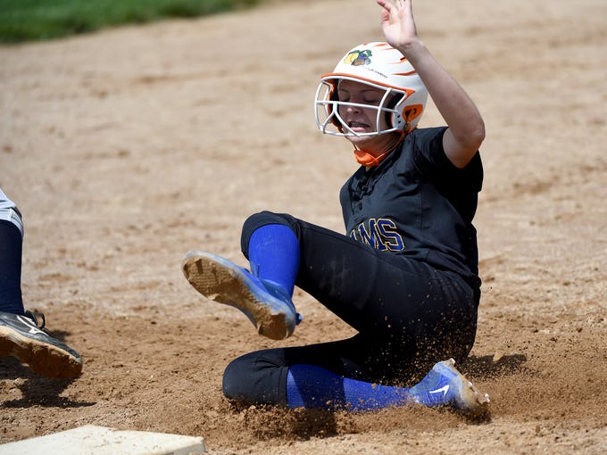 Kennard-Dale's Jaedyn McKeon slides into third during