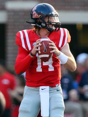 Mississippi Rebels quarterback Bo Wallace (14) drops back to pass during the game against the Southeast Missouri State Redhawks at Vaught-Hemingway Stadium. Mississippi Rebels defeated the Southeast Missouri State Redhawks 31-13.