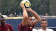 AS Roma midfielder Kevin Strootman throws a ball as