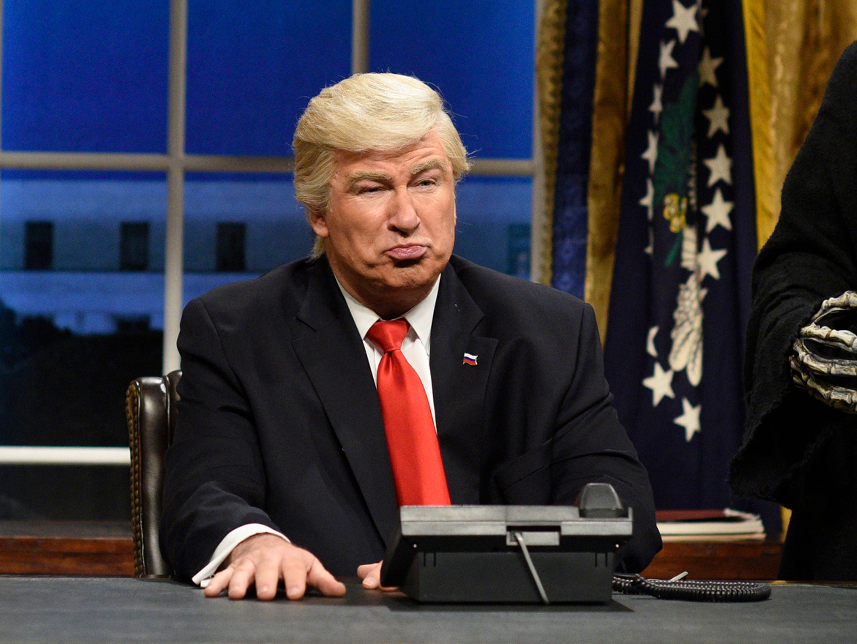 FILE - This Feb. 4, 2017 file photo released by NBC shows Alec Baldwin portraying President Donald Trump in the opening sketch of 