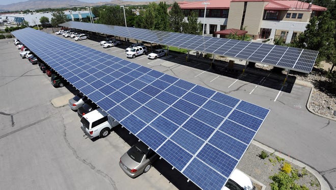Hundreds of solar panels have been installed in a parking lot at the 
Sparks Police Station.