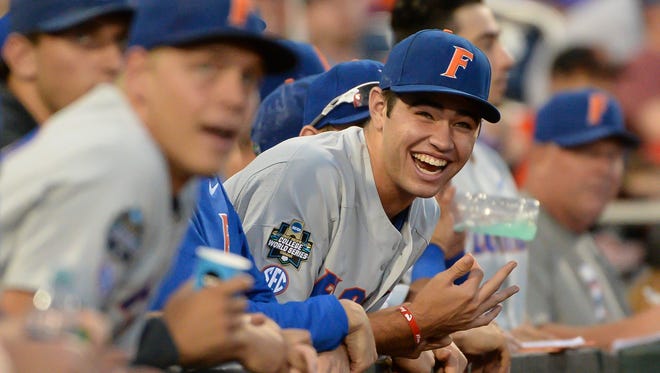 Florida Gators pitcher Cole Maye reacts to a play in the field in the seventh inning.