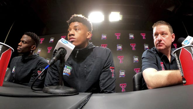 Texas Tech's Norense Odiase, left, Jarrett Culver and head coach Chris Beard listen to a question during a news conference for the championship of the Final Four NCAA college basketball tournament, Sunday, April 7, 2019, in Minneapolis. Texas Tech will play Virginia on Monday for the national championship. (AP Photo/Tim Donnelly)