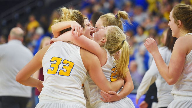 Aberdeen celebrates after their win against Brandon Valley Friday, March 16, at the Denny Sanford Premier Center in Sioux Falls.