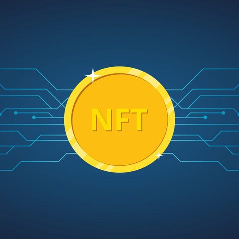 NFT gold token against a blue background