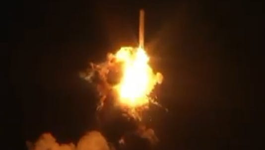A photo taken from video shows a rocked exploding after liftoff.