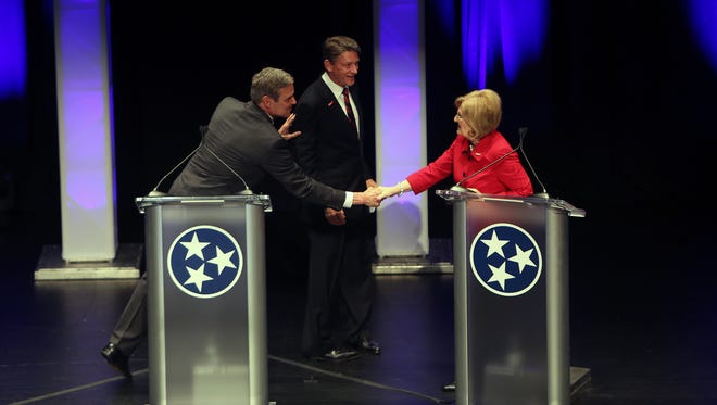 April 18, 2018 - (Left to right) - Bill Lee, Randy Boyd and Diane Black converse at the conclusion of the West Tennessee Gubernatorial Debate at the Halloran Center in Memphis on Wednesday.