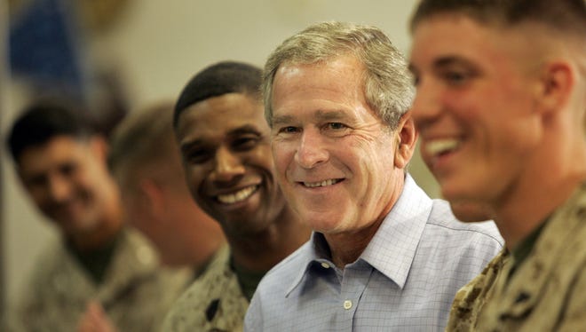 President George W. Bush goes through the chow line at the Marine Air Ground Task Force Training Center at Twentynine Palms.