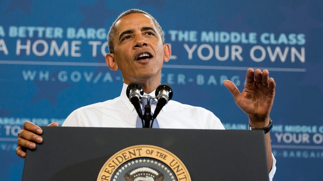 President Obama speaks about housing on Aug. 6, 2013, at Desert Vista High School in Phoenix.
