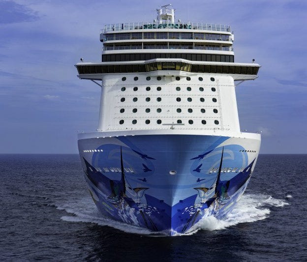 A view of Norwegian Escape as seen from its front. The 4,248-passenger vessel is chock full of amusements ranging from a massive water park to the largest ropes course at sea.