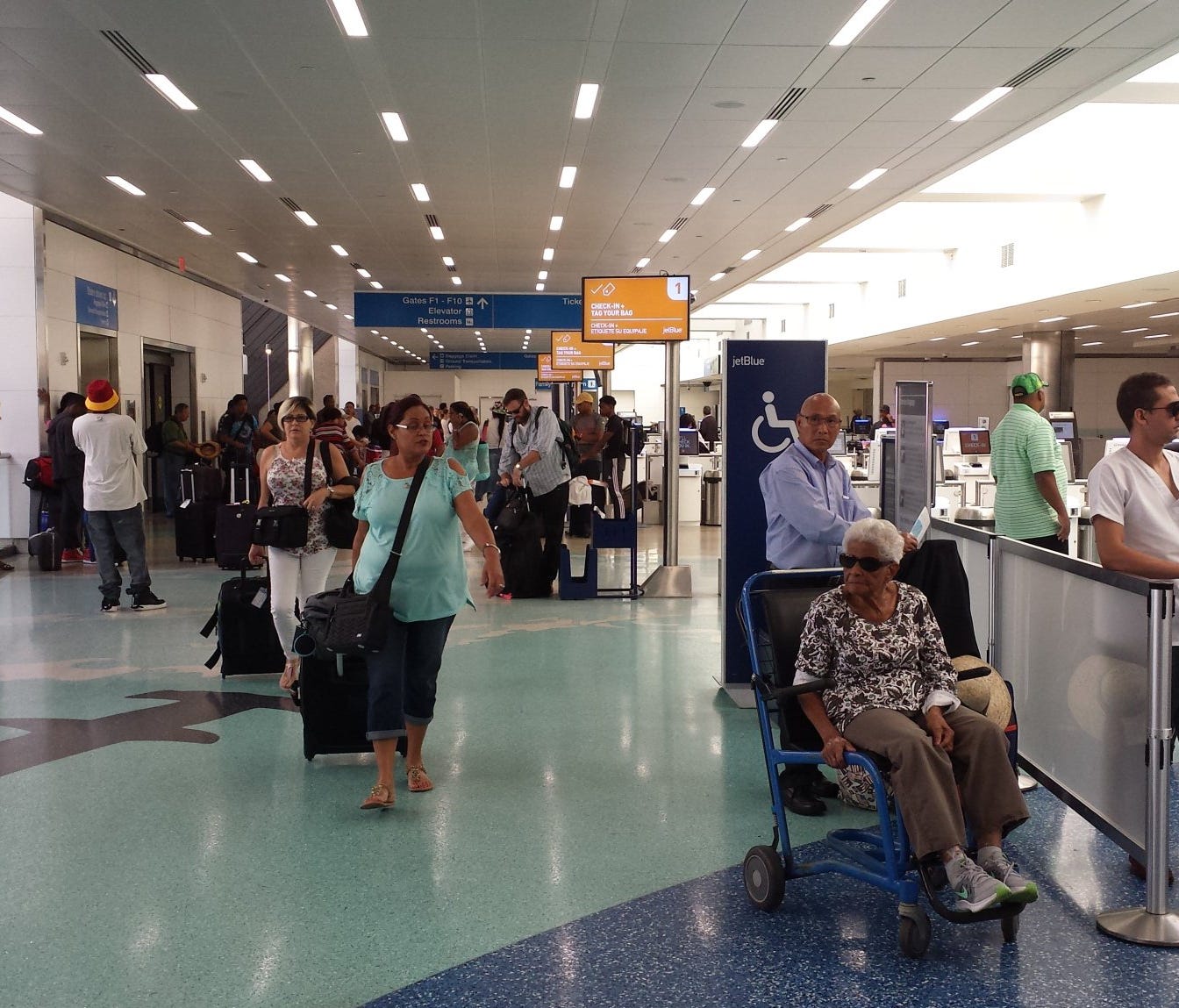 This photo, shared by the Fort Lauderdale airport, shows passenges moving through the terminals there on Tuesday, Sept. 12, 2017.