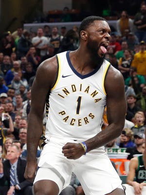 Pacers guard Lance Stephenson (1) reacts after a dunk against the Boston Celtics at Bankers Life Fieldhouse.