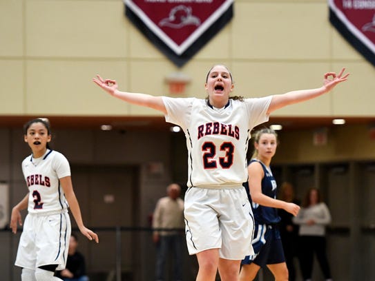 Saddle River Day's Michelle Sidor celebrates a three-pointer