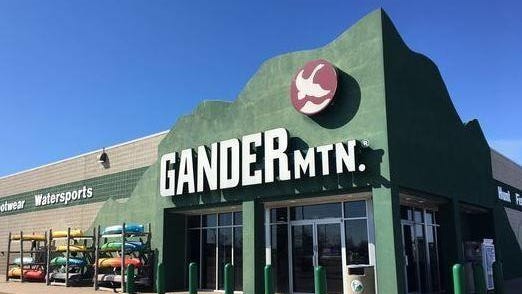 Gander Mountain will remain open in Grand Chute while its parent company searches for a buyer.