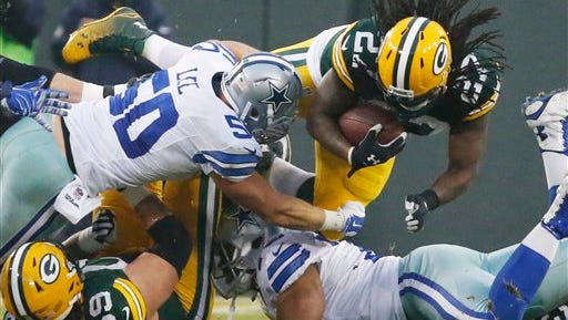 Green Bay Packers' Eddie Lacy runs during the first half of an NFL football game against the Dallas Cowboys Sunday.