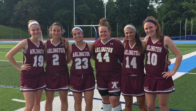 The Arlington girls lacrosse team's seniors, L to R: Lauren Tarnowski, Rosie DeBellis, Bianca Assenza, Maddie Minnow, Emily Klausz and Abby Carlin