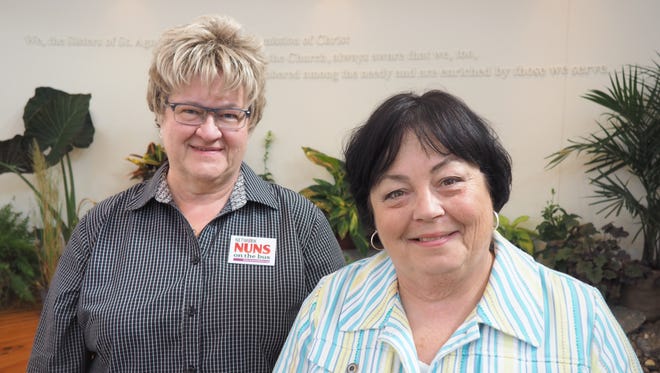 Sister Julie Ann Crahl, CSA, Ph.D., left, and Sister Clare S. Lawlor, CSA, Psy.D., both alumnae of Marian University, will be on the Nuns on the Bus trip to the Republican National Convention.