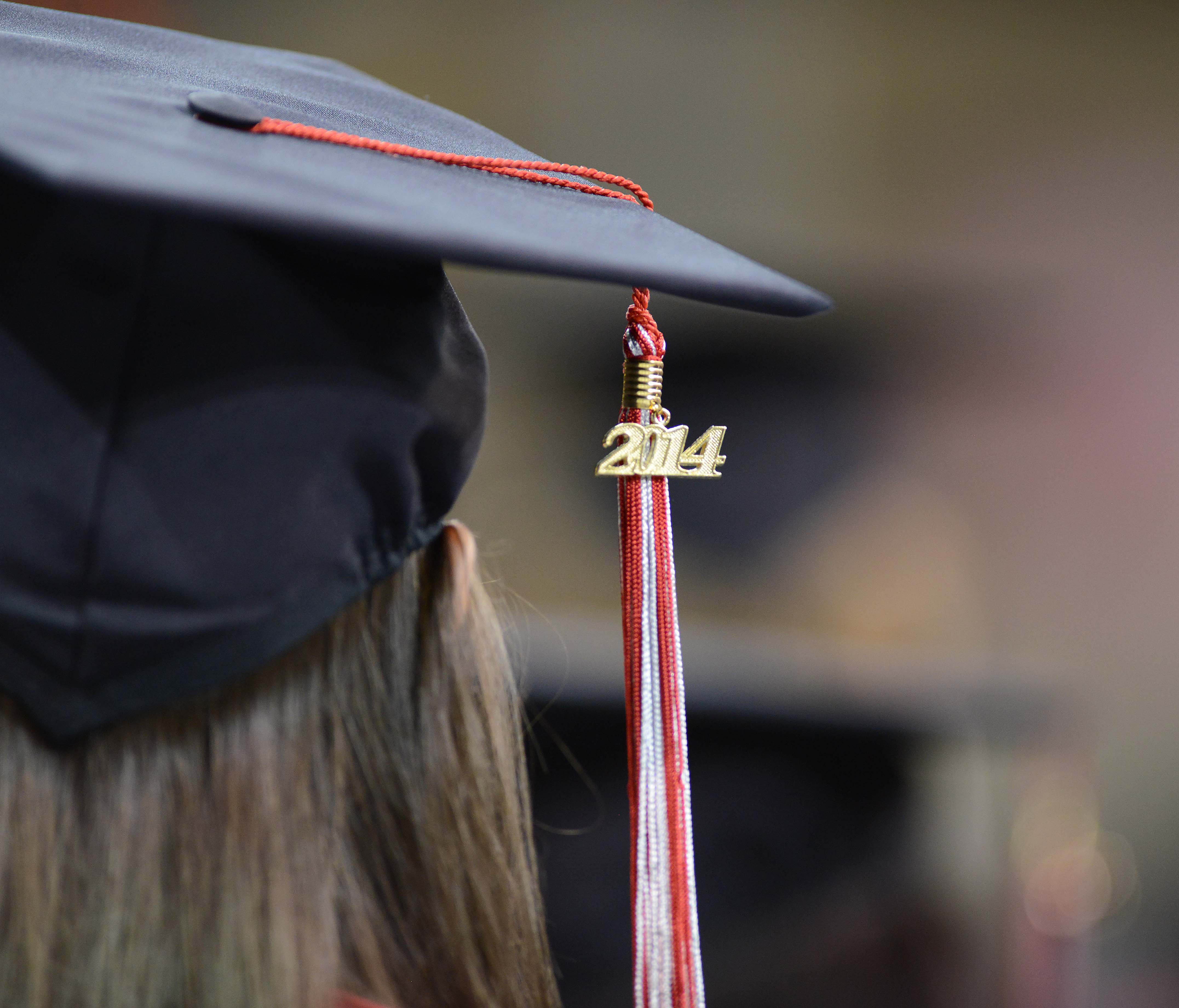 File photo taken in 2014 shows a graduate of Northwest Florida State College wears her graduation cap at the school's commencement ceremony in Niceville, Fla.