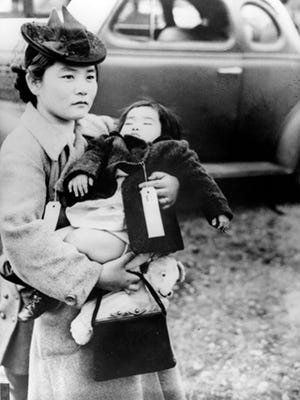 Japanese Americans sent to an internment camp in Bainbridge Island, Wash., in 1942.