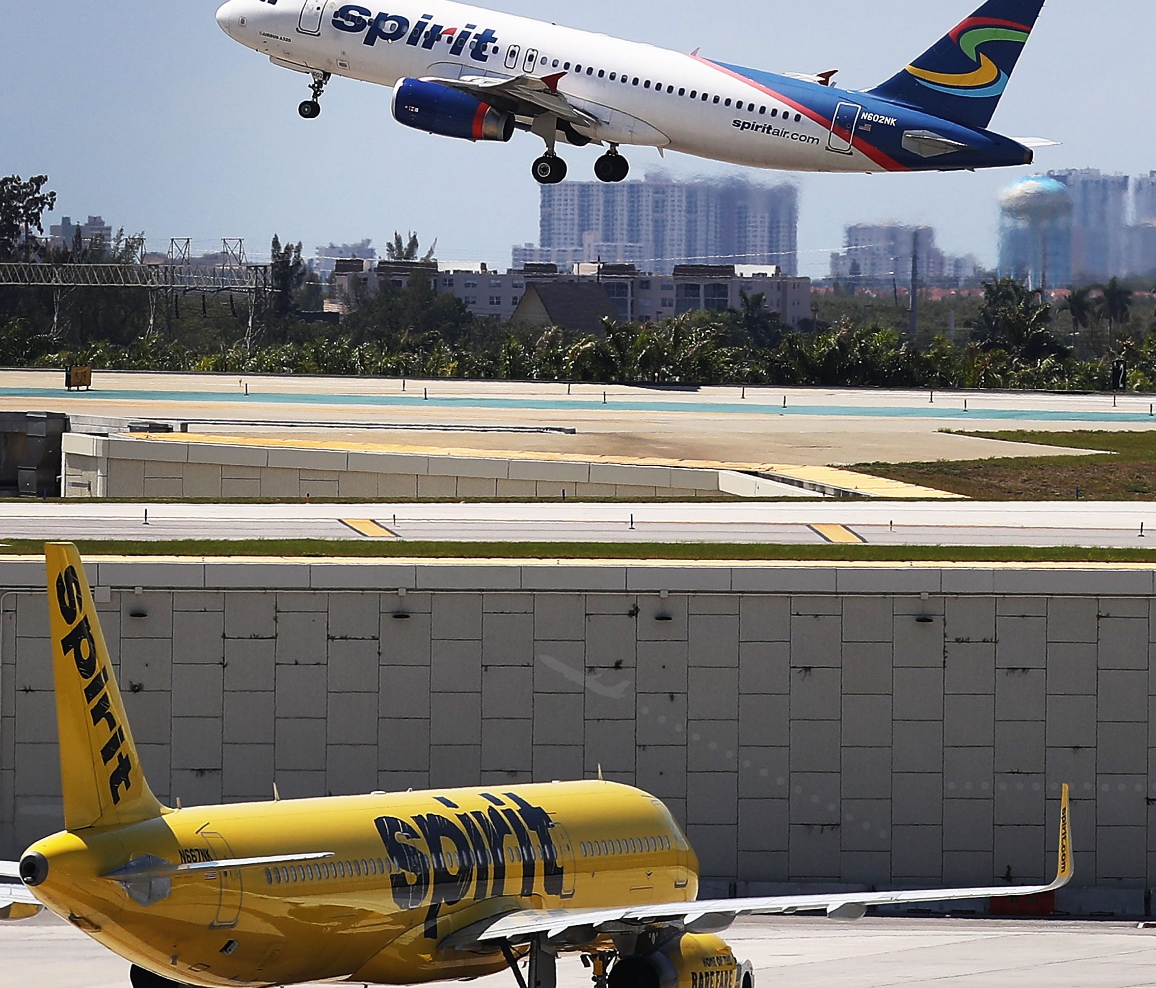 A Spirit Airlines plane takes off at Fort Lauderdale-Hollywood International Airport on May 9, 2017. 