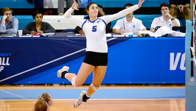 Freshman Jaali Winters leaps high to spike the ball during Creighton's victory at No. 23 North Carolina in a second-round match of the NCAA Tournament on Saturday. Winters had 21 kills and a career-high 21 digs as the Bluejays advanced to the Sweet 16 for the first time in program history.