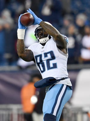 Titans tight end Delanie Walker (82) hauls in a pass before the AFC Divisional Playoff game at Gillette Stadium Saturday, Jan. 13, 2018, in Foxborough, Mass.